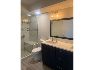 Completely remodeled 2BR + Den/2BA first-floor condo in The on Bonita Fairways in Florida - for sale on GolfHomes.com, golf home, golf lot