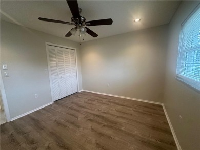 This 55 and over  2 bedroom 2 bath 1129 sq ft condo is located on Beacon Woods Golf Club in Florida - for sale on GolfHomes.com, golf home, golf lot