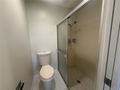 This 55 and over  2 bedroom 2 bath 1129 sq ft condo is located on Beacon Woods Golf Club in Florida - for sale on GolfHomes.com, golf home, golf lot