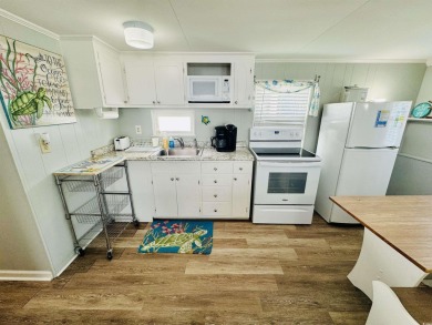 WELL MAINTAINED 2 BED/2 BATH BEACH HOUSE JUST STEPS TO THE BEACH on Prestwick Country Club in South Carolina - for sale on GolfHomes.com, golf home, golf lot