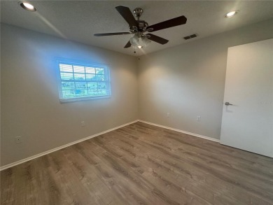 This 55 and over  2 bedroom 2 bath 1129 sq ft condo is located on Beacon Woods Golf Club in Florida - for sale on GolfHomes.com, golf home, golf lot