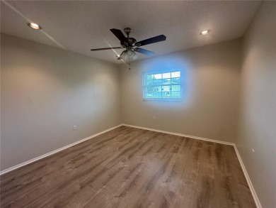 This 55 and over  2 bedroom 2 bath 1129 sq ft condo is located on Beacon Woods Golf Club in Florida - for sale on GolfHomes.com, golf home, golf lot