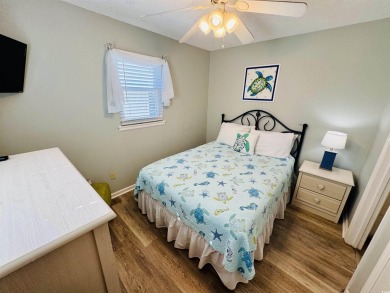 WELL MAINTAINED 2 BED/2 BATH BEACH HOUSE JUST STEPS TO THE BEACH on Prestwick Country Club in South Carolina - for sale on GolfHomes.com, golf home, golf lot