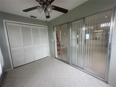 This 55 and over  2 bedroom 2 bath 1129 sq ft condo is located on Beacon Woods Golf Club in Florida - for sale on GolfHomes.com, golf home, golf lot
