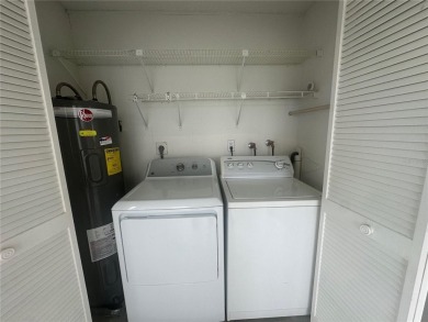 This 55 and over  2 bedroom 2 bath 1129 sq ft condo is located on Beacon Woods Golf Club in Florida - for sale on GolfHomes.com, golf home, golf lot