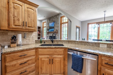 Aggressively priced two-story brick and stone home located in on Rivercut Golf Course in Missouri - for sale on GolfHomes.com, golf home, golf lot