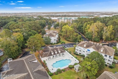 Charming 3 bedroom, 2 bath 1st floor condo nestled in the on Oyster Bay Golf Links in North Carolina - for sale on GolfHomes.com, golf home, golf lot