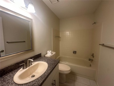 This 55 and over  2 bedroom 2 bath 1129 sq ft condo is located on Beacon Woods Golf Club in Florida - for sale on GolfHomes.com, golf home, golf lot