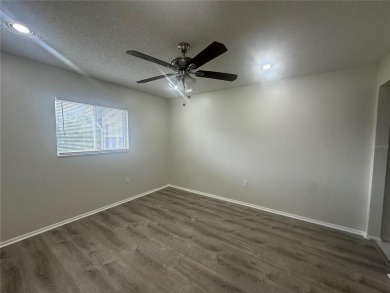 This 55 and over  2 bedroom 2 bath 1129 sq ft condo is located on Beacon Woods Golf Club in Florida - for sale on GolfHomes.com, golf home, golf lot