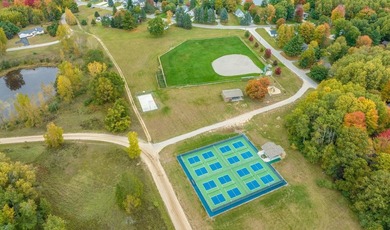 Great Lot right across the street from Lake Laura. and Greenwood on Canadian Lakes Country Club-The Royal Course in Michigan - for sale on GolfHomes.com, golf home, golf lot