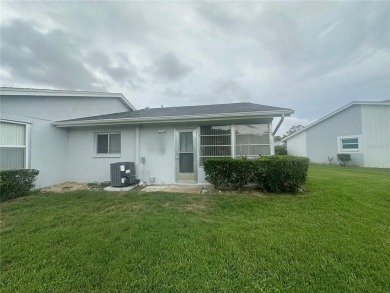 This 55 and over  2 bedroom 2 bath 1129 sq ft condo is located on Beacon Woods Golf Club in Florida - for sale on GolfHomes.com, golf home, golf lot