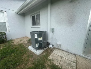 This 55 and over  2 bedroom 2 bath 1129 sq ft condo is located on Beacon Woods Golf Club in Florida - for sale on GolfHomes.com, golf home, golf lot