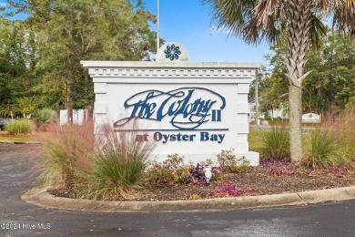 Charming 3 bedroom, 2 bath 1st floor condo nestled in the on Oyster Bay Golf Links in North Carolina - for sale on GolfHomes.com, golf home, golf lot