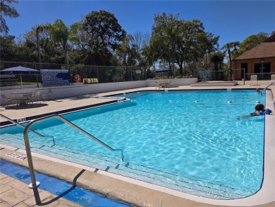 This 55 and over  2 bedroom 2 bath 1129 sq ft condo is located on Beacon Woods Golf Club in Florida - for sale on GolfHomes.com, golf home, golf lot