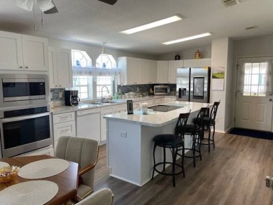 Meticulously cared for one-owner gem, showcasing pristine on Four Lakes Golf Club in Florida - for sale on GolfHomes.com, golf home, golf lot