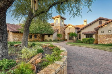 This custom built Donahoo home invites you to indulge in a life on Apple Rock Golf Course - Horseshoe Bay in Texas - for sale on GolfHomes.com, golf home, golf lot