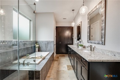 Enter this oasis where the custom solid steel front door opens on Lago Vista Golf Club in Texas - for sale on GolfHomes.com, golf home, golf lot
