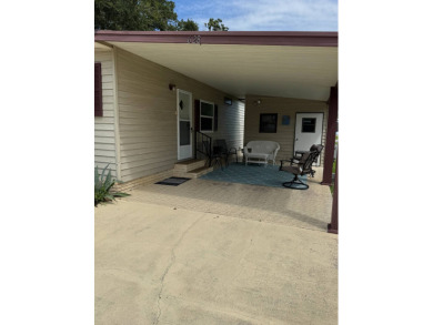 This well-maintained 2-bedroom, 2-bath home offers 1,255 sq. ft on Golden Lakes Golf Course in Florida - for sale on GolfHomes.com, golf home, golf lot