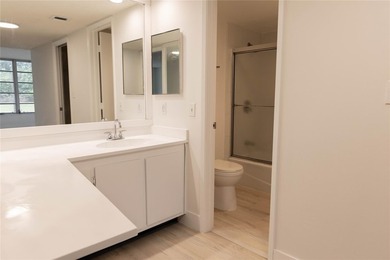 Take a look at this beautiful condo in Palm Aire with new floors on Palm-Aire Country Club and Resort - Palms in Florida - for sale on GolfHomes.com, golf home, golf lot