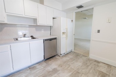 Take a look at this beautiful condo in Palm Aire with new floors on Palm-Aire Country Club and Resort - Palms in Florida - for sale on GolfHomes.com, golf home, golf lot