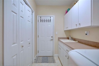 Welcome to this beautifully updated 3-bedroom, 2-bathroom home on Sun n Lake Golf and Country Club in Florida - for sale on GolfHomes.com, golf home, golf lot