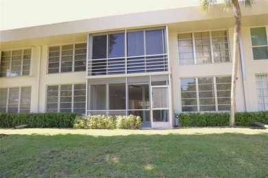 Take a look at this beautiful condo in Palm Aire with new floors on Palm-Aire Country Club and Resort - Palms in Florida - for sale on GolfHomes.com, golf home, golf lot