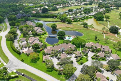 Discover this stunning two-bedroom, two-bath villa, perfectly on Palm Beach Polo and Country Club in Florida - for sale on GolfHomes.com, golf home, golf lot