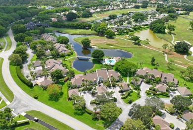 Discover this stunning two-bedroom, two-bath villa, perfectly on Palm Beach Polo and Country Club in Florida - for sale on GolfHomes.com, golf home, golf lot