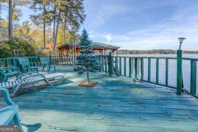 Panoramic big water views from this charming DEEDED lakefront on Turtle Cove Golf Course in Georgia - for sale on GolfHomes.com, golf home, golf lot