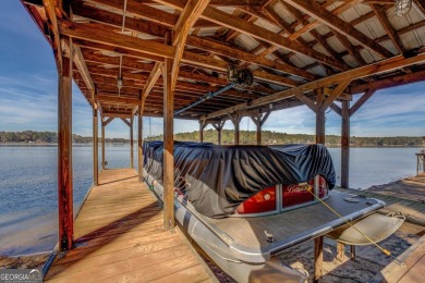 Panoramic big water views from this charming DEEDED lakefront on Turtle Cove Golf Course in Georgia - for sale on GolfHomes.com, golf home, golf lot