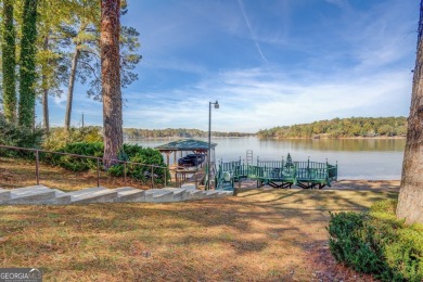 Panoramic big water views from this charming DEEDED lakefront on Turtle Cove Golf Course in Georgia - for sale on GolfHomes.com, golf home, golf lot