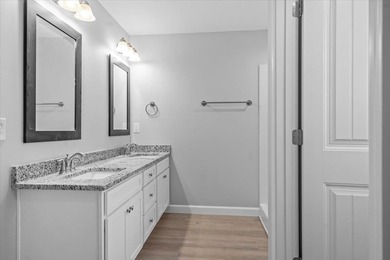 The Ridge plan! The primary suite, laundry, and living area fill on Woodfin Ridge Golf Club in South Carolina - for sale on GolfHomes.com, golf home, golf lot