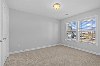 The Ridge plan! The primary suite, laundry, and living area fill on Woodfin Ridge Golf Club in South Carolina - for sale on GolfHomes.com, golf home, golf lot