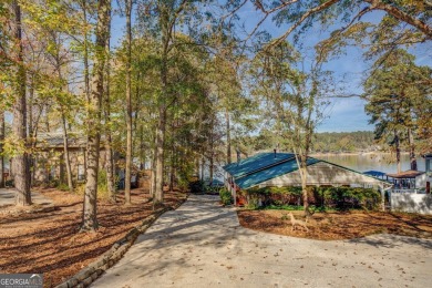 Panoramic big water views from this charming DEEDED lakefront on Turtle Cove Golf Course in Georgia - for sale on GolfHomes.com, golf home, golf lot