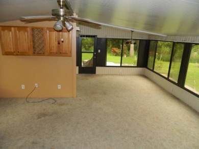 Lovely oasis in backyard, this 1,467 sq ft home on a perimeter on Grasslands Golf and Country Club in Florida - for sale on GolfHomes.com, golf home, golf lot