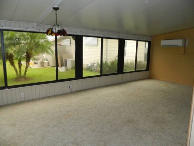 Lovely oasis in backyard, this 1,467 sq ft home on a perimeter on Grasslands Golf and Country Club in Florida - for sale on GolfHomes.com, golf home, golf lot