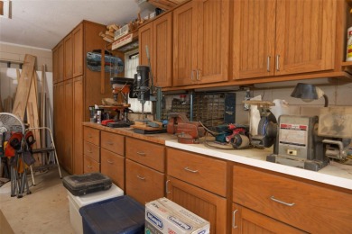 Under contract-accepting backup offers. Absolutely impeccable on Tuscawilla Country Club in Florida - for sale on GolfHomes.com, golf home, golf lot