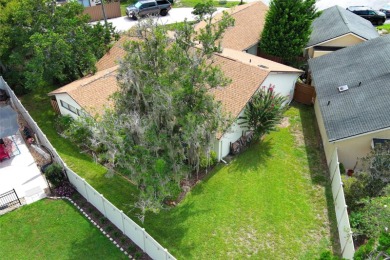 Under contract-accepting backup offers. Absolutely impeccable on Tuscawilla Country Club in Florida - for sale on GolfHomes.com, golf home, golf lot