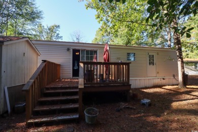 Welcome to 619 McGee Dr, a charming 3-bedroom, 2-bathroom home on Arrowhead Country Club in South Carolina - for sale on GolfHomes.com, golf home, golf lot