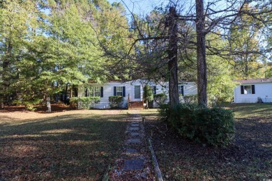 Welcome to 619 McGee Dr, a charming 3-bedroom, 2-bathroom home on Arrowhead Country Club in South Carolina - for sale on GolfHomes.com, golf home, golf lot