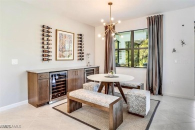 This upgraded 2023 Pulte Summerwood floor plan features an on River Hall Country Club in Florida - for sale on GolfHomes.com, golf home, golf lot