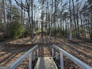 This Lake Hartwell lot has a perfect grade for a walkout on Fox Wood Hills Golf Course in South Carolina - for sale on GolfHomes.com, golf home, golf lot