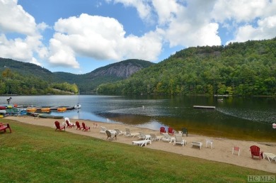 Nestled within the confines of the Bald Rock community, this on Sapphire National Golf Club in North Carolina - for sale on GolfHomes.com, golf home, golf lot