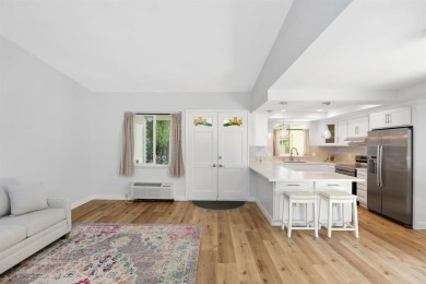 Welcome to this beautifully transformed and private end-unit on Laguna Woods Village Golf Course in California - for sale on GolfHomes.com, golf home, golf lot
