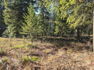 Wooded building lot in Western Montana. Lots is located in an on Trestle Creek Golf Course in Montana - for sale on GolfHomes.com, golf home, golf lot