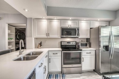 Step into this bright, move-in-ready 2BR/2BA condo in the heart on Old Marsh Golf Club in Florida - for sale on GolfHomes.com, golf home, golf lot