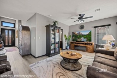 This stunning two-story single-family residence has been on The Oasis Golf Club in Nevada - for sale on GolfHomes.com, golf home, golf lot