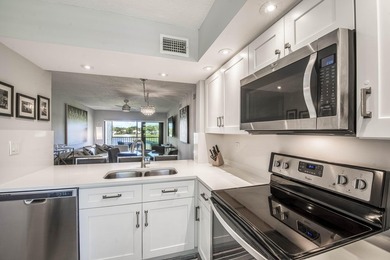 Step into this bright, move-in-ready 2BR/2BA condo in the heart on Old Marsh Golf Club in Florida - for sale on GolfHomes.com, golf home, golf lot