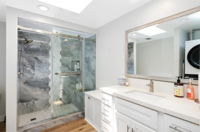 Welcome to this beautifully transformed and private end-unit on Laguna Woods Village Golf Course in California - for sale on GolfHomes.com, golf home, golf lot
