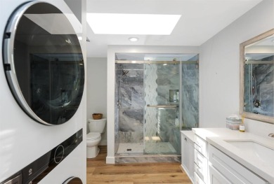 Welcome to this beautifully transformed and private end-unit on Laguna Woods Village Golf Course in California - for sale on GolfHomes.com, golf home, golf lot